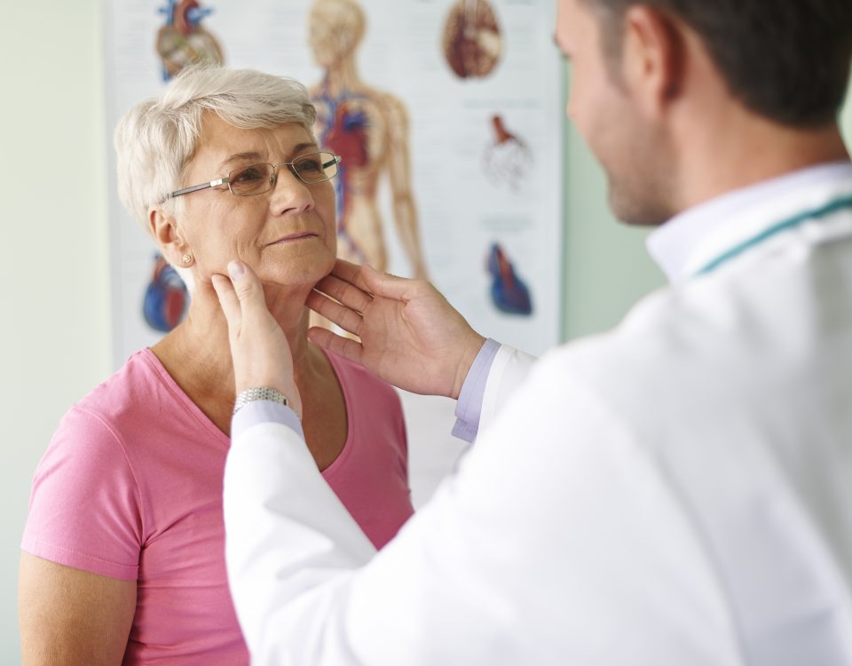 Older patient throat exam